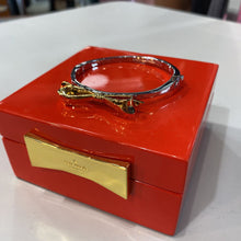 Load image into Gallery viewer, Kate Spade gold bow bangle in box