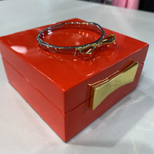 Load image into Gallery viewer, Kate Spade gold bow bangle in box