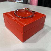 Load image into Gallery viewer, Kate Spade gold bow bangle in box