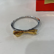 Load image into Gallery viewer, Kate Spade gold bow bangle in box