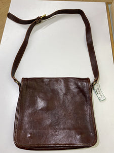 Raw brown leather crossbody flap