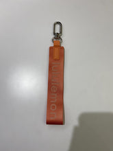 Load image into Gallery viewer, Lululemon Never Lost Keychain
