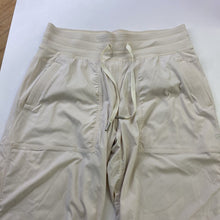 Load image into Gallery viewer, Lululemon lined pull on pants 8
