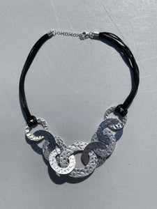Silver looping rings necklace