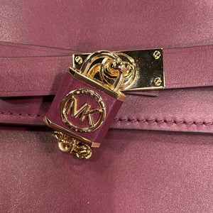 Michael Kors gold hardware leather handbag
