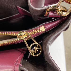 Michael Kors gold hardware leather handbag