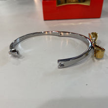 Load image into Gallery viewer, Kate Spade gold bow bangle in box
